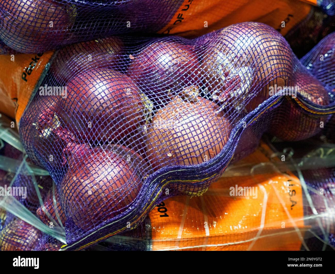 Onions at a produce market ready for sale Stock Photo