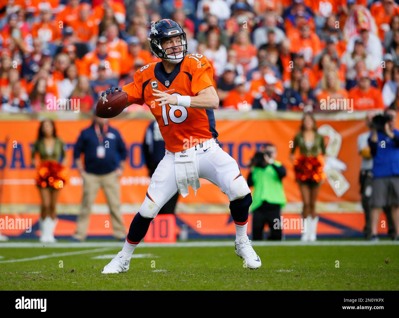 Denver Broncos quarterback Peyton Manning drops back to pass during an ...