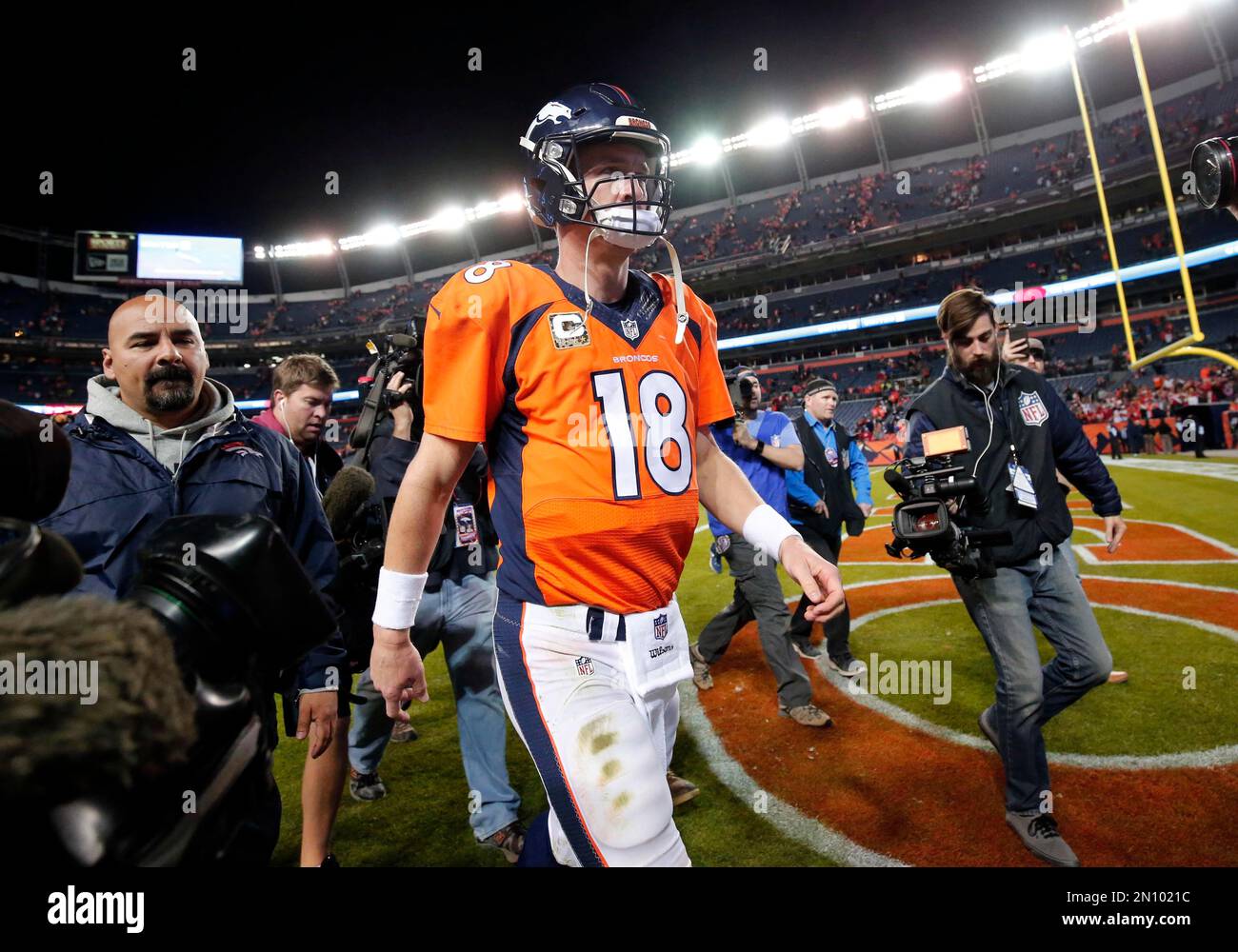 Denver Broncos quarterback Peyton Manning (18) leaves the field after ...