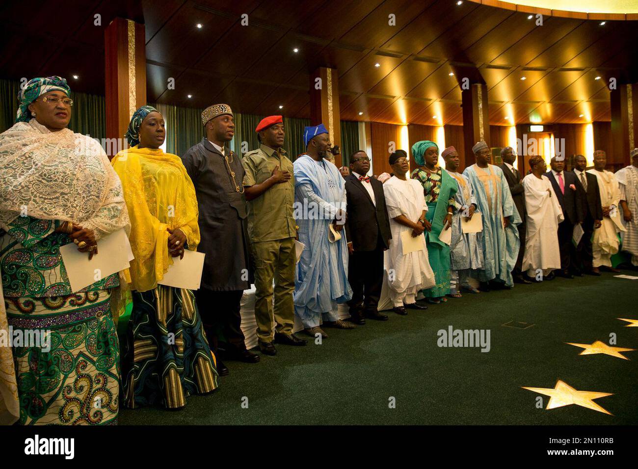 Nigeria newly sworn in ministers sing Nigeria national anthem at