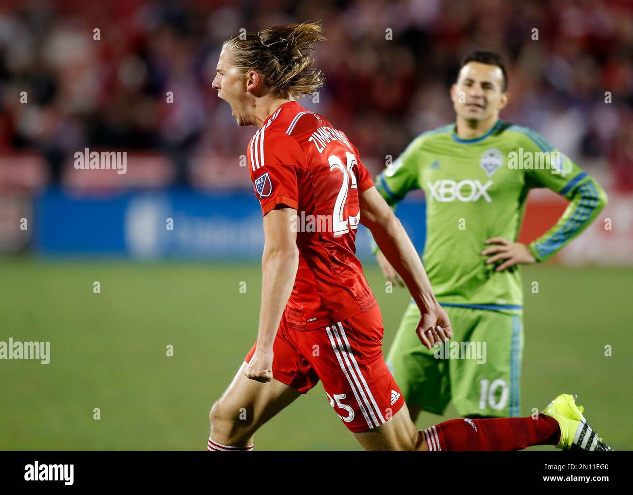 FC Dallas defender Walker Zimmerman (25) reacts to scoring the teams