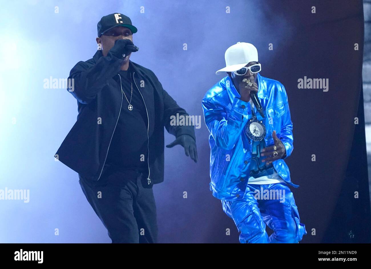 Chuck D, left, and Flavor Flav perform "Rebel Without a Pause" at the 65th annual Grammy Awards