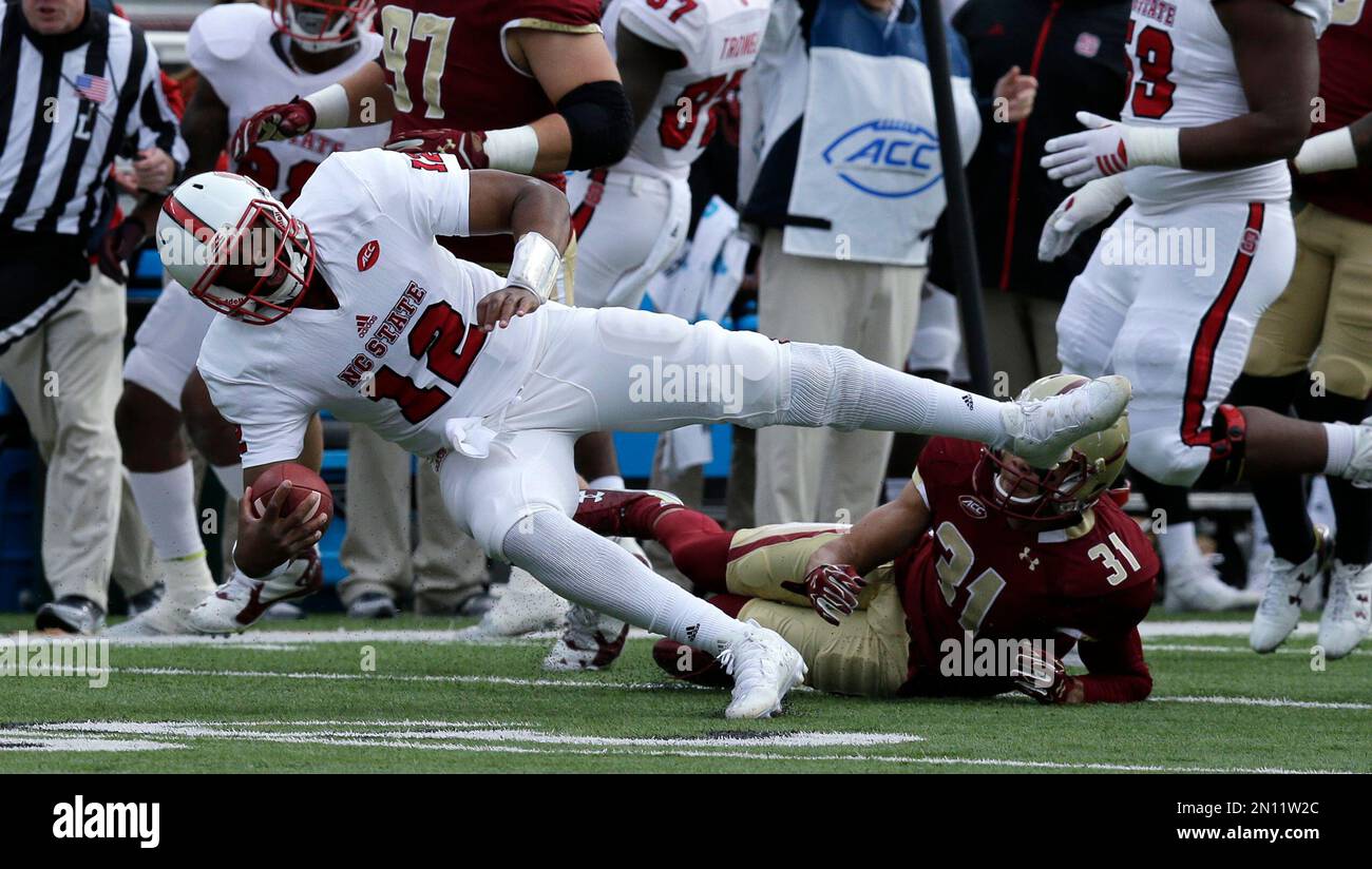 North Carolina State quarterback Jacoby Brissett rushes during the