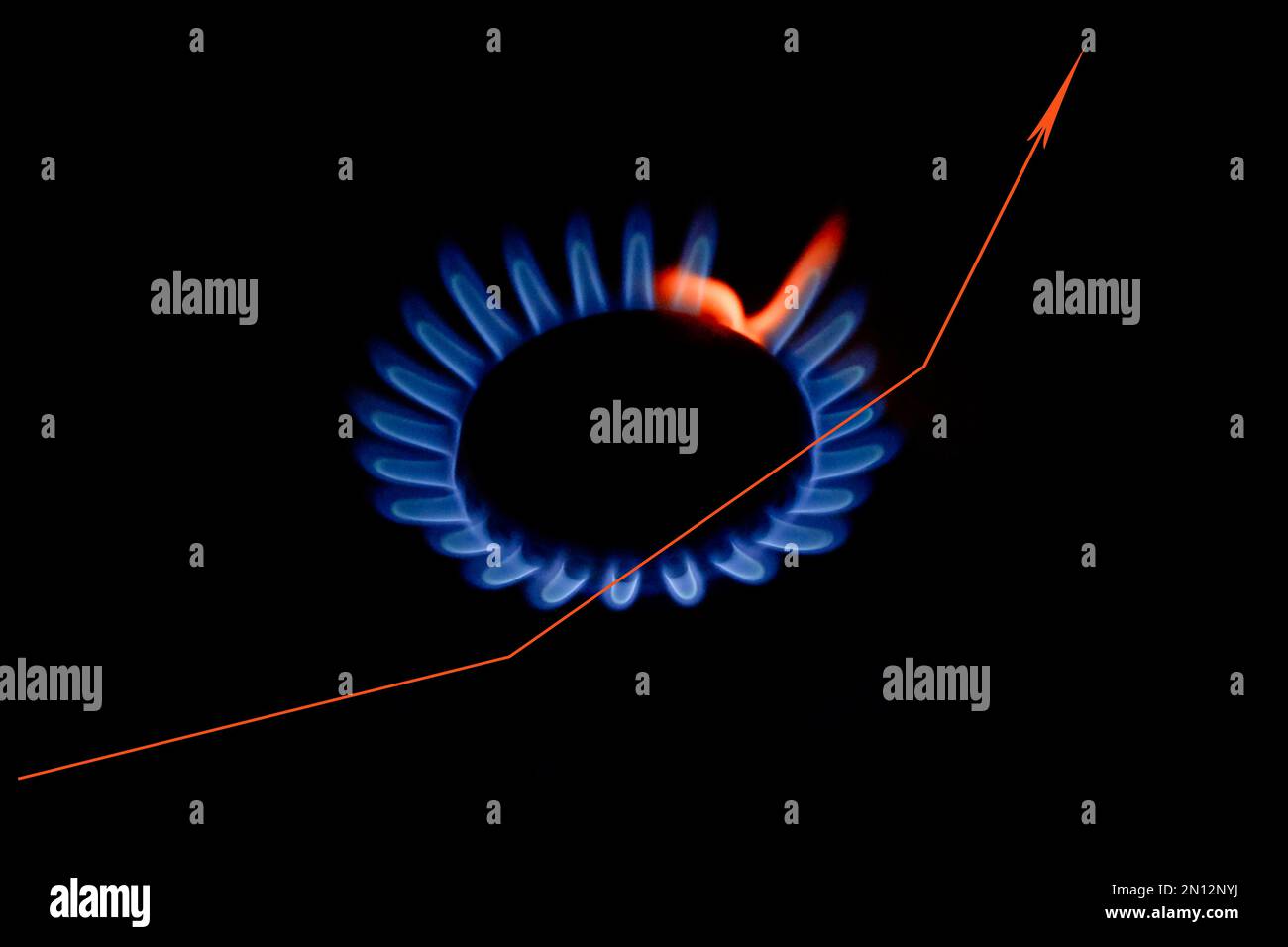 Blue gas flame, with a red arrow pointing upwards, price increase, energy price Stock Photo Alamy