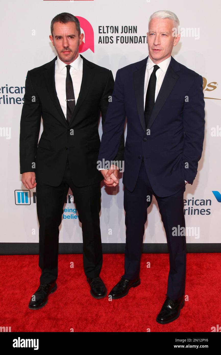 Benjamin Maisani, left, and Anderson Cooper, attend the Elton John AIDS