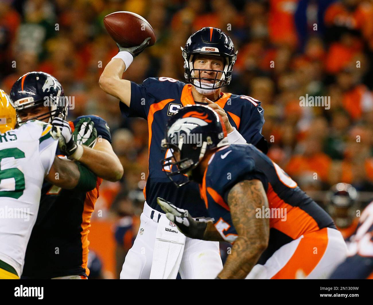 Denver Broncos quarterback Peyton Manning (18) throws against the Green ...