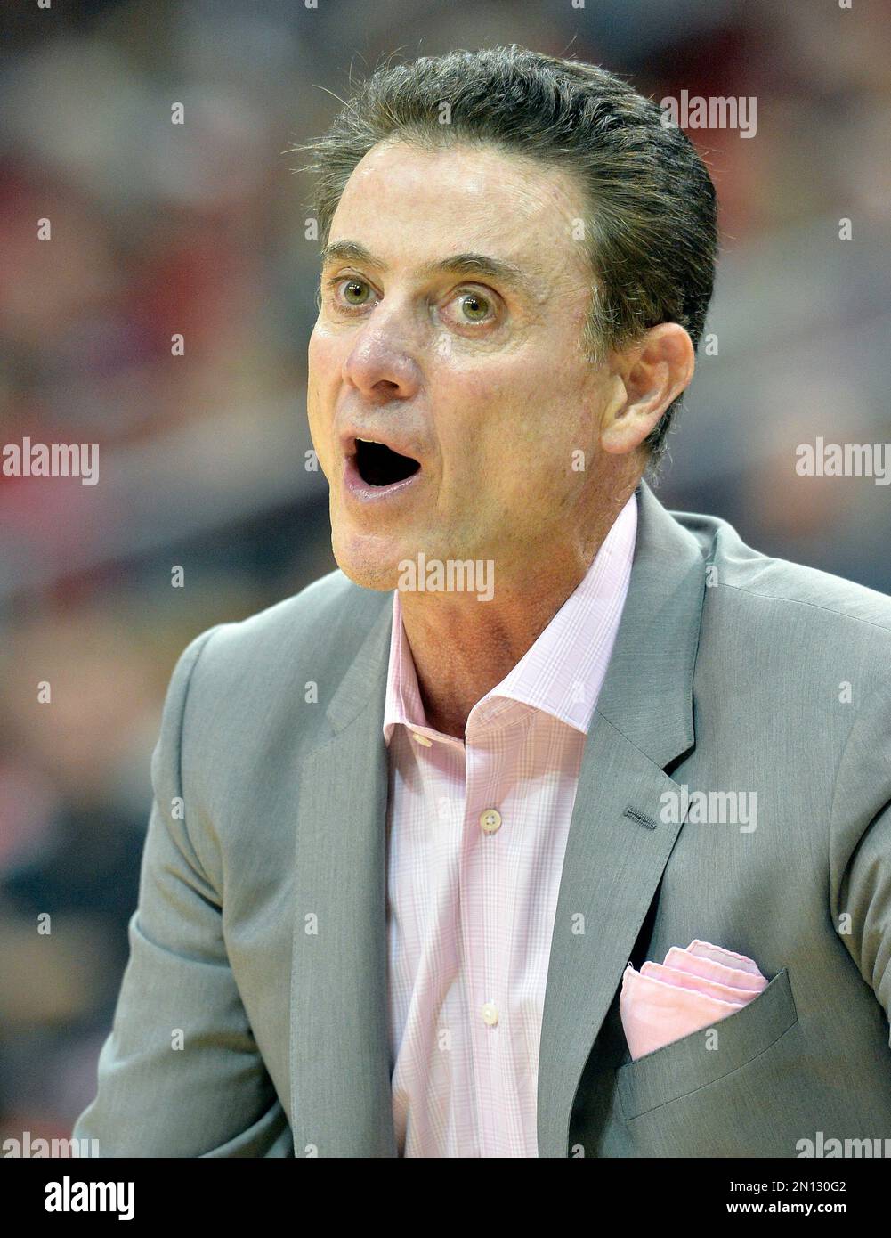 Louisville head basketball coach Rick Pitino argues a call with a
