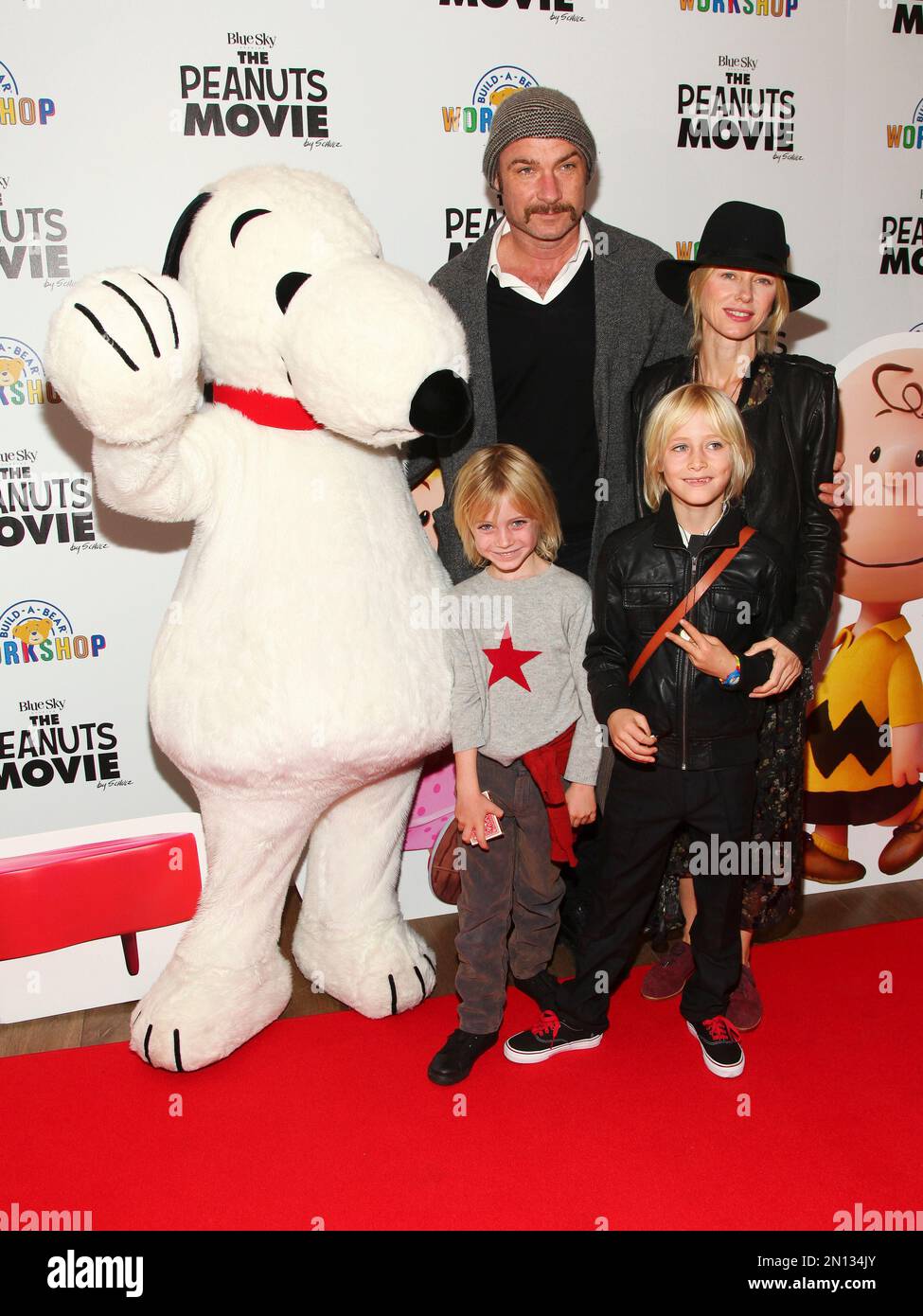 Liev Schreiber, left, and Naomi Watts, right, with children Samuel