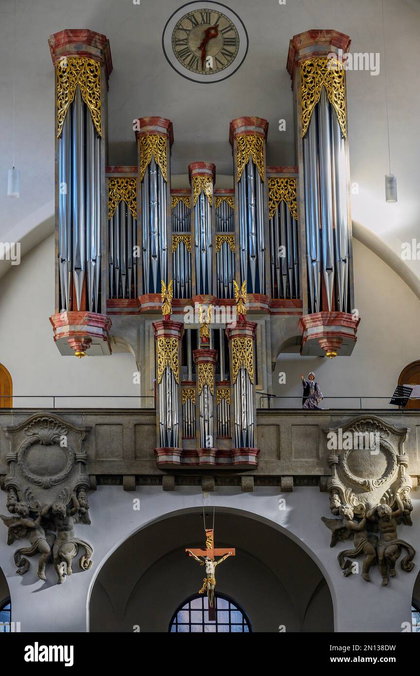 Organ and clock, St. Anton Catholic Church in Kempten Allgäu, Bavaria, Germany, Europe Stock Photo