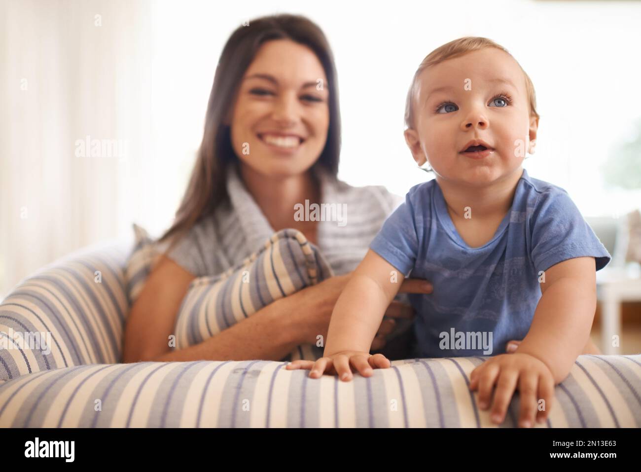 She takes after her mom. An adorable little girl with her mother Stock