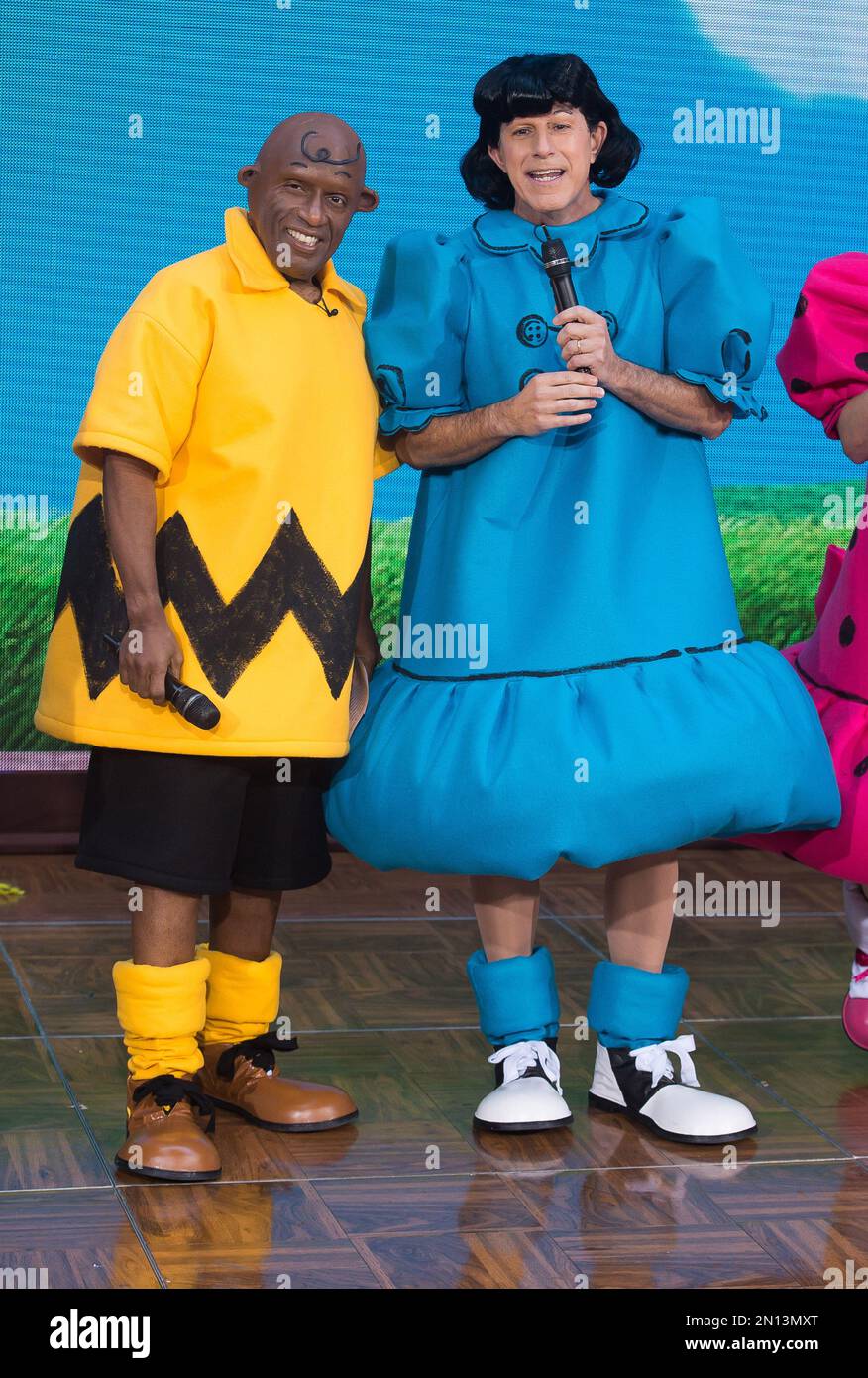 Al Roker, left, and Matt Lauer dress as Charlie Brown and Lucy from