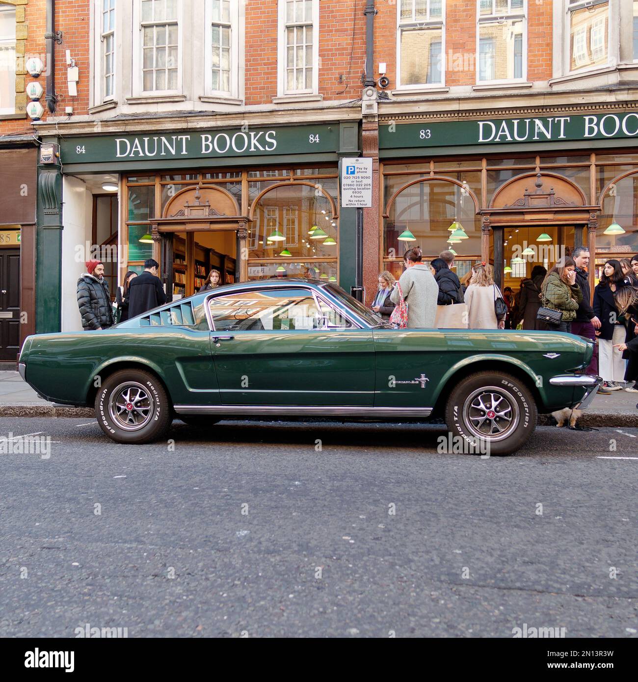 1965 Mustang Fastback in Green, parked on Marylebone High Street, outside of Daunt Books London England Stock Photo