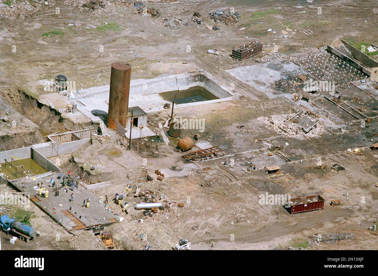 Investigators continue their search for evidence a the Branch Davidian compound near Waco, Texas, May 4, 1993, focusing on an underground room, bottom left. The bodies of 72 people including cult leader David Koresh, have been removed so far. (AP Photo/Ron Heflin) Stock Photo