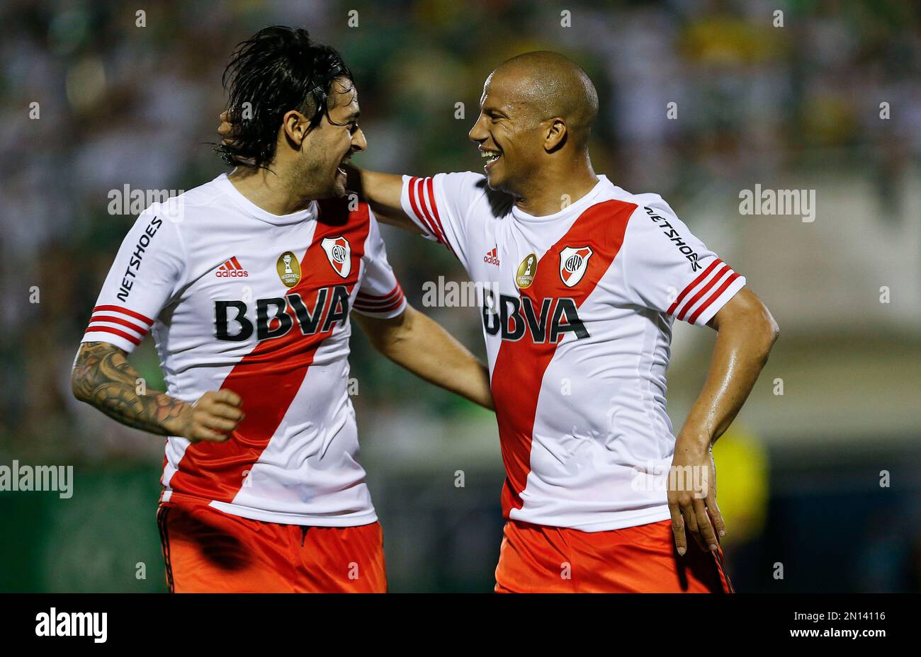 Carlos Andres Sanchez of Argentina's River Plate, right, celebrates with  teammate Leonardo Pisculichi after scoring against Brazil's Chapecoense  during a Copa Sudamericana soccer match in Chapeco, Brazil, Wednesday, Oct.  28, 2015. (AP