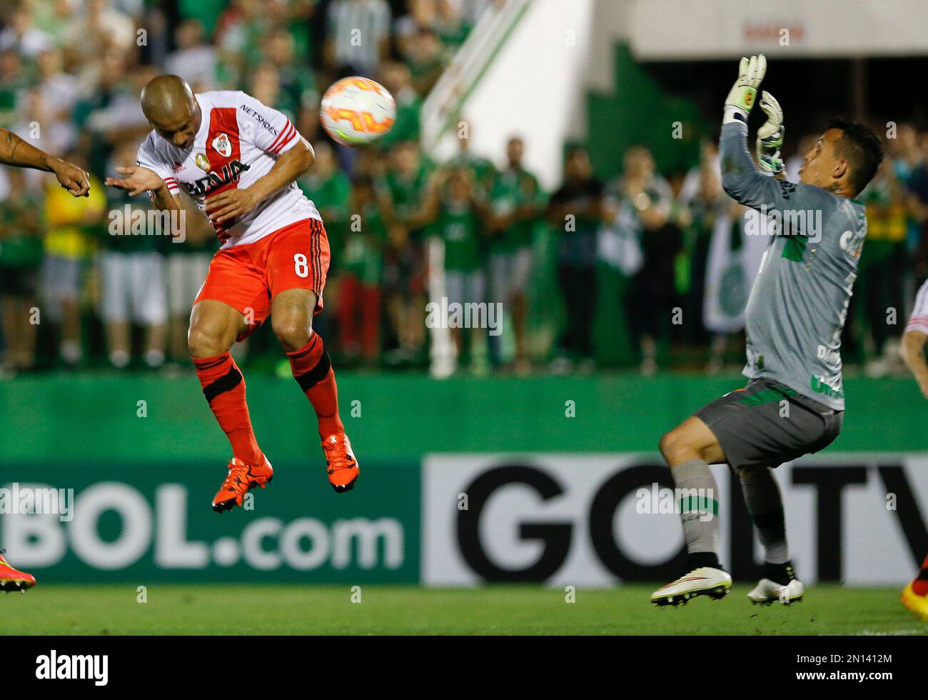 Carlos Andres Sanchez of Argentina's River Plate, left, scores against  goalkeeper Danilo of Brazil's Chapecoense during a Copa Sudamericana soccer  match in Chapeco, Brazil, Wednesday, Oct. 28, 2015. (AP Photo/Andre Penner  Stock