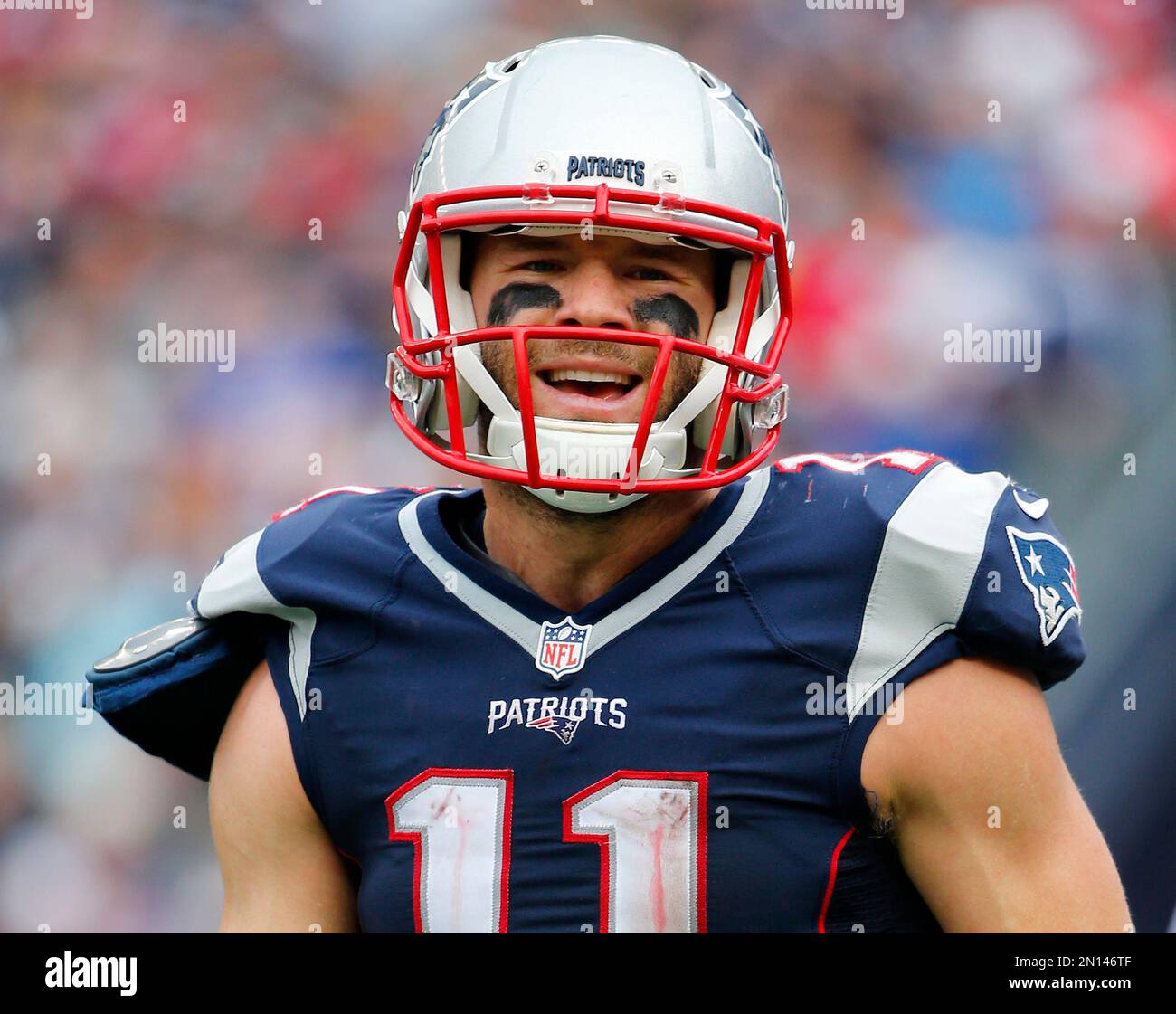 New England Patriots wide receiver Julian Edelman smiles during a NFL ...