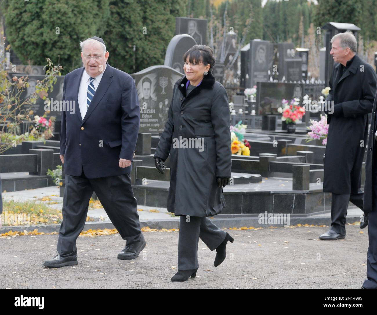 U.S. Commerce Secretary Penny Pritzker visits a Jewish cemetery in the ...
