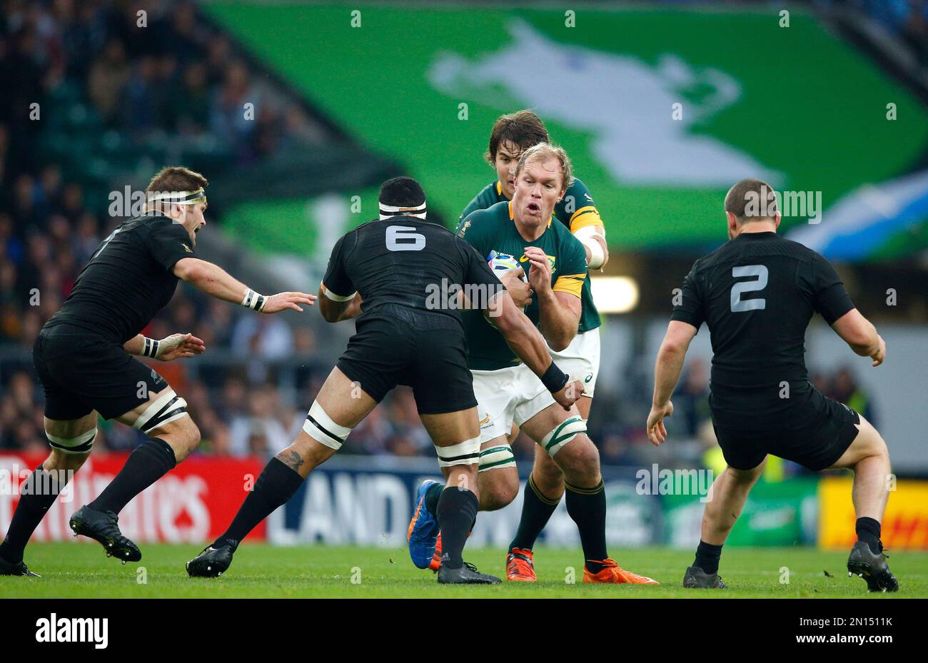 South Africa's Schalk Burger charges at the All Black defence during ...