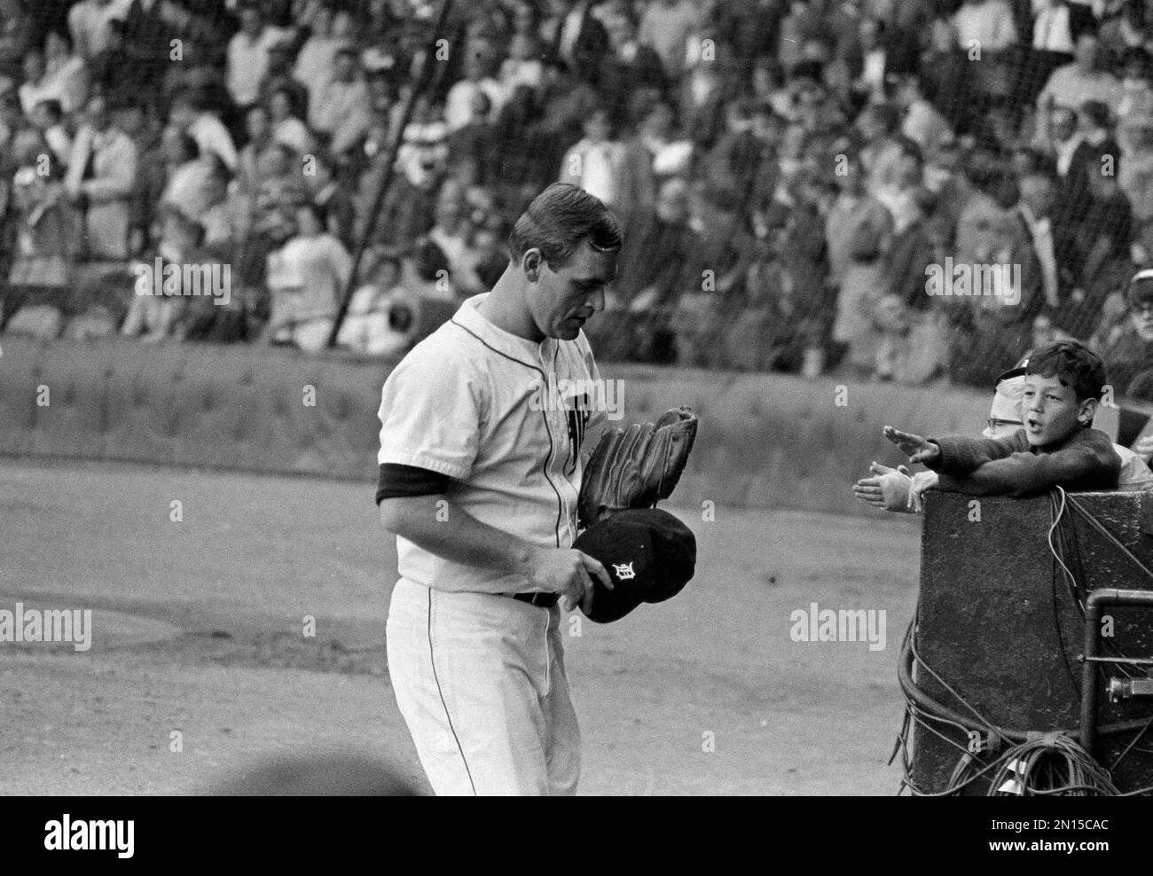 Detroit Tigers ace pitcher Denny McLain shows off a large stuffed