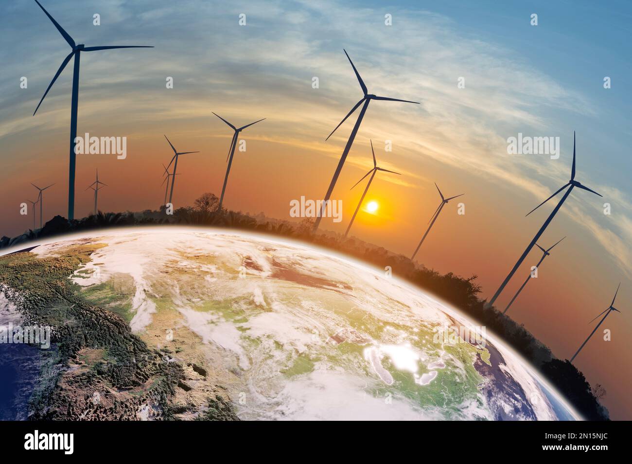 Field of wind turbines on the earth at sunset To produce clean