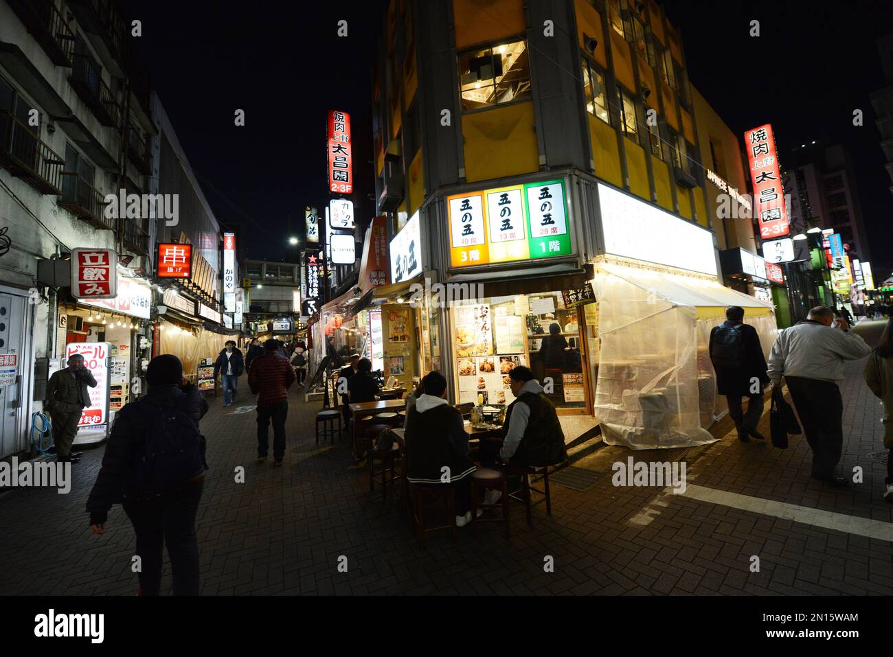 Walking between the bars, clubs and restaurants in the narrow streets