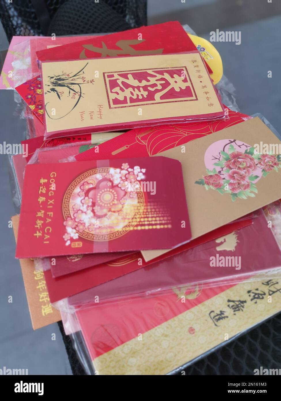 A pile of red packet containing gift of money packed inside given as token  of good wishes during auspicious occasions for the Chinese people Stock  Photo - Alamy