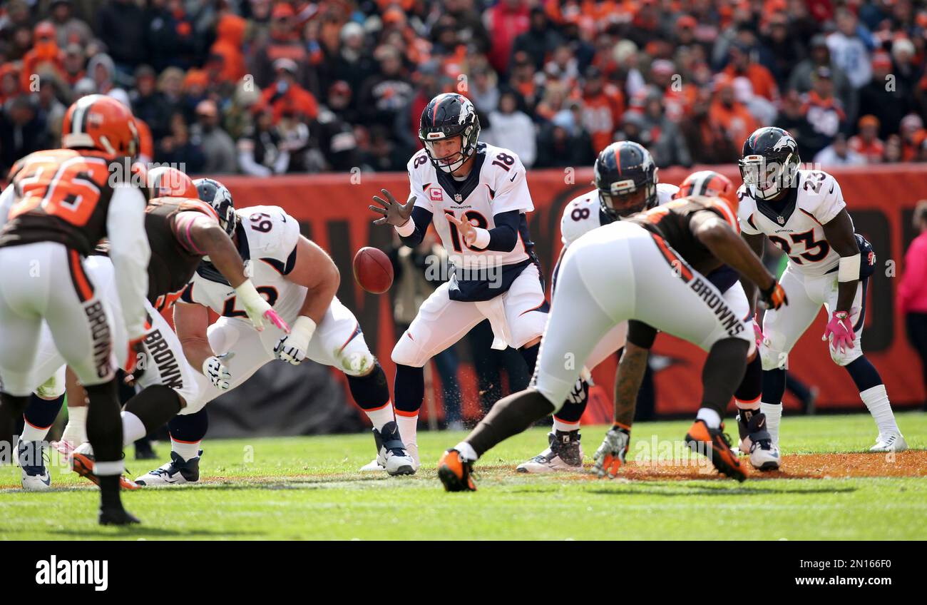 Denver Broncos quarterback Peyton Manning (18) watches a replay against the  Detroit Lions during the first half of an NFL football game, Sunday, Sept.  27, 2015, in Detroit. (AP Photo/Paul Sancya Stock