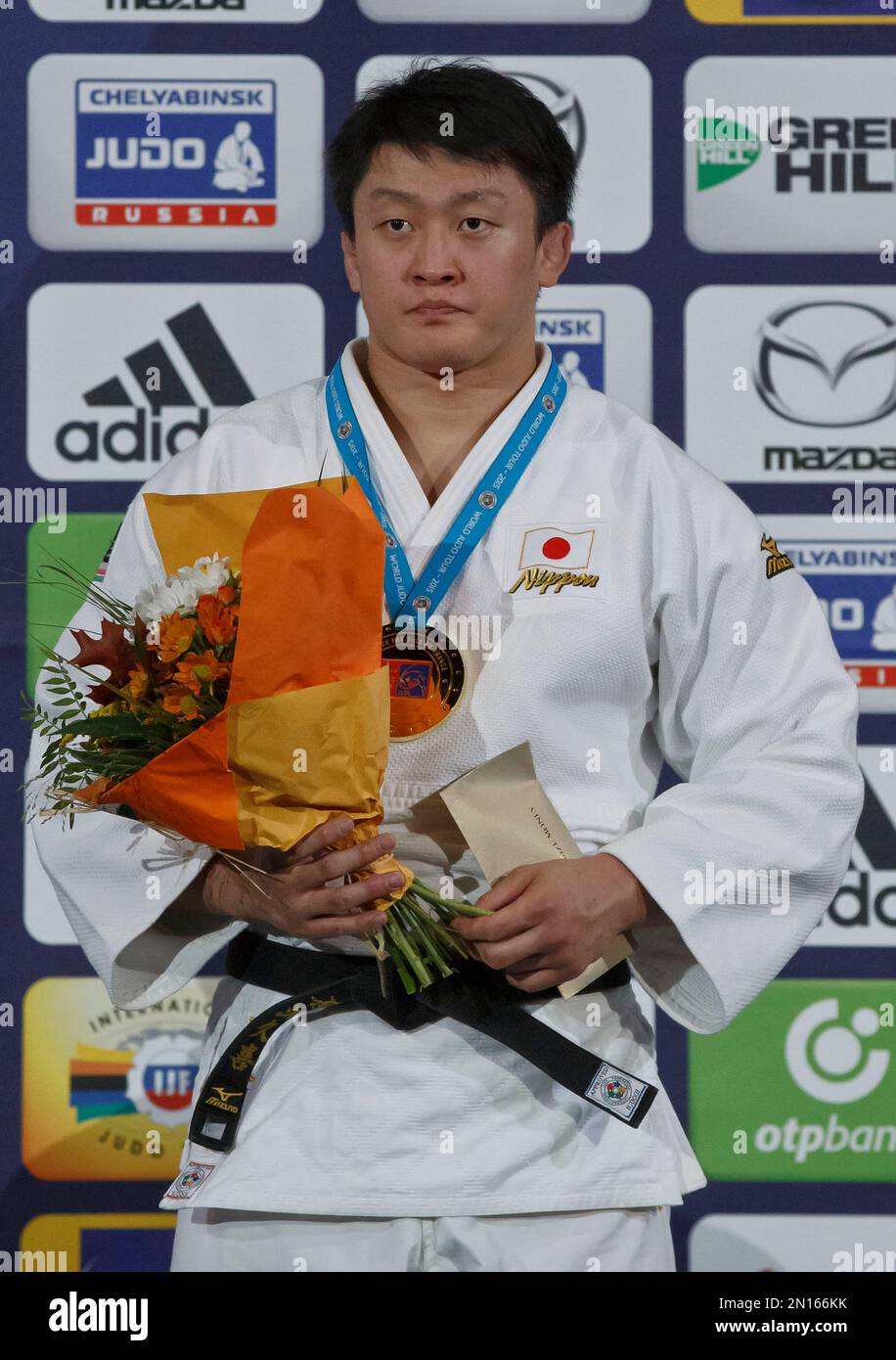 Hisayoshi Harasawa of Japan poses with the gold medal of the men's +100