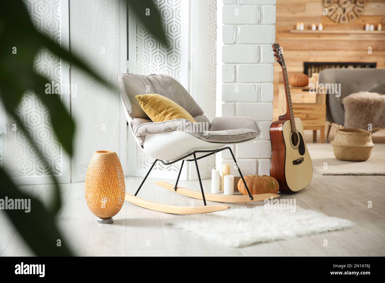 Cozy living room interior inspired by autumn colors Stock Photo - Alamy