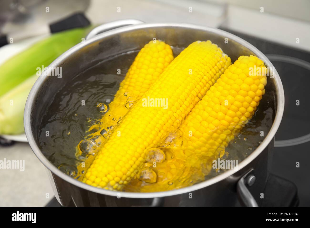 Boiling fresh juicy corn in hi-res stock photography and images - Alamy