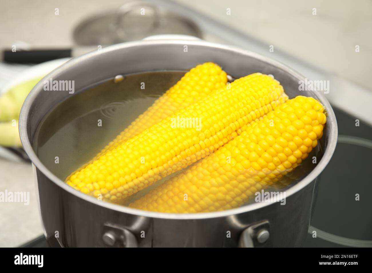 Boiling fresh juicy corn in hi-res stock photography and images - Alamy