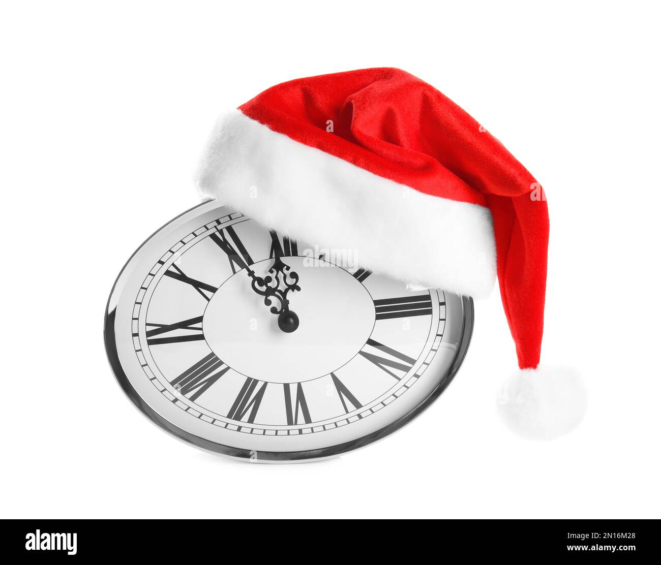 Clock with Santa hat showing five minutes until midnight on white