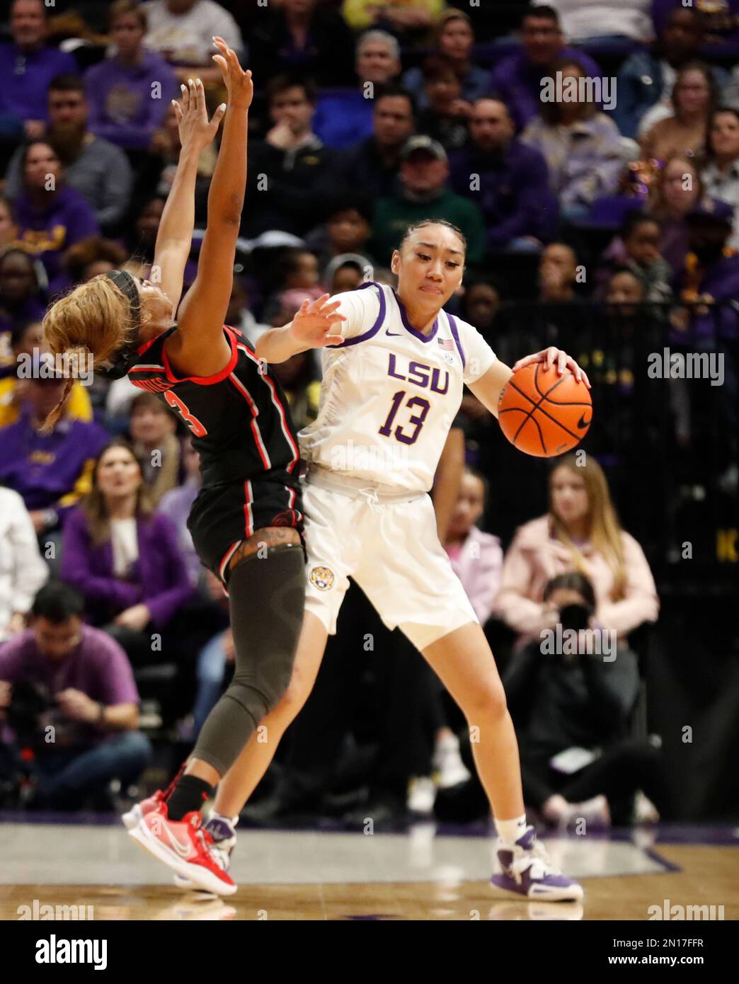 Baton Rouge, USA. 02nd Feb, 2023. LSU Lady Tigers guard Last-Tear Poa (13) tries to get some space between her a Georgia Lady Bulldogs guard Diamond Battles (3) during a women's college basketball game at the Pete Maravich Assembly Center in Baton Rouge, Louisiana on Thursday, February 2, 2023. (Photo by Peter G. Forest/Sipa USA) Credit: Sipa USA/Alamy Live News Stock Photo