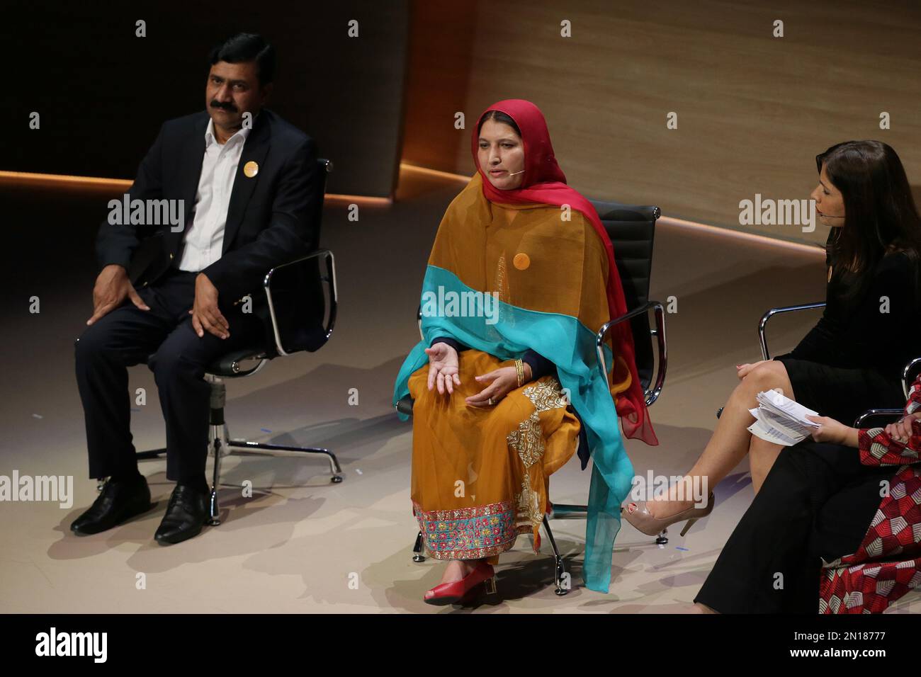The mother and father of Malala Yousafzai, Ziauddin Yousafzai, left