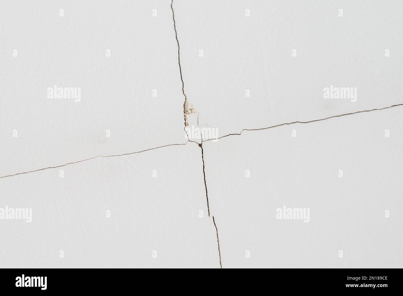 The gypsum boards covered on the ceiling due to expansion cracked by