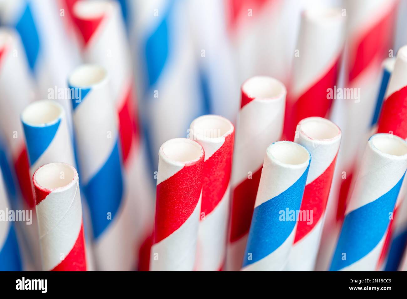 Multi-colored paper straws for drinks close-up, macro shot. Stock Photo