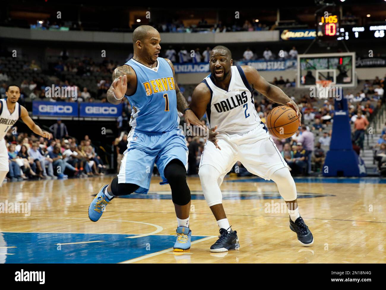 Denver Nuggets guard Jameer Nelson (1) defends as Dallas Mavericks guard Raymond Felton (2