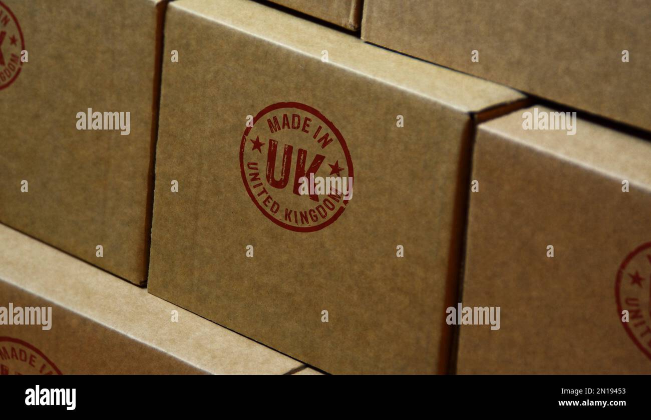 Made in UK stamp printed on cardboard box. Factory, manufacturing and production country concept. Stock Photo