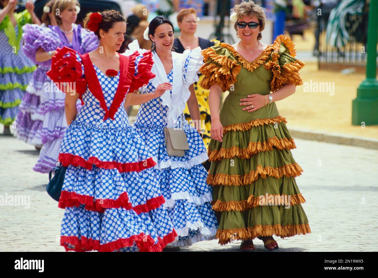 Women in costume at the Seville Fair Stock Photo