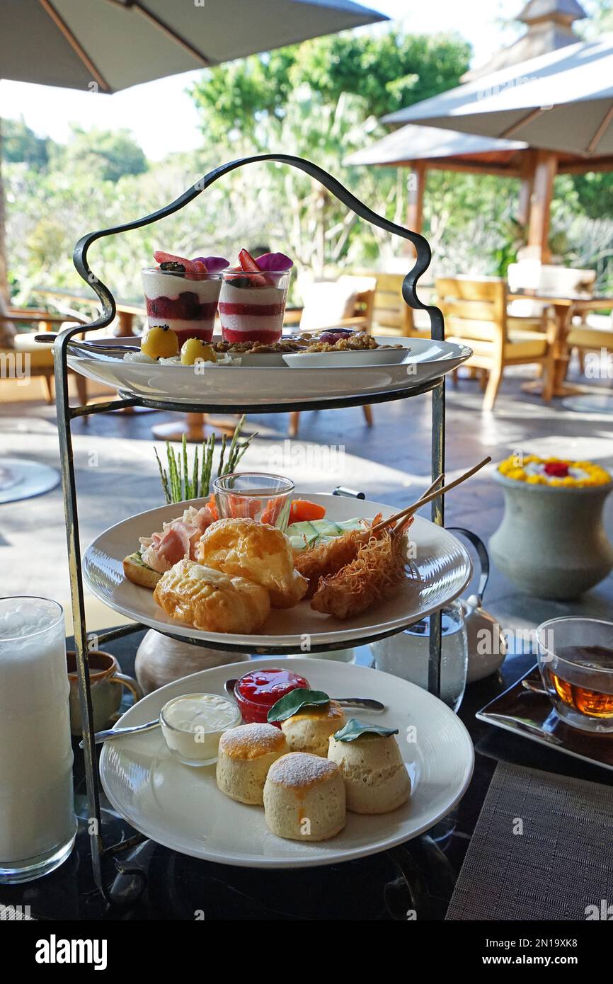 Afternoon tea and dessert served with northern Thai food set Stock Photo