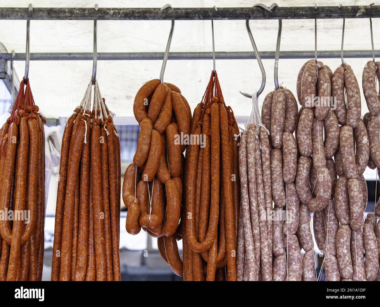 Detail of dried pork sausage, fatty and unhealthy food Stock Photo