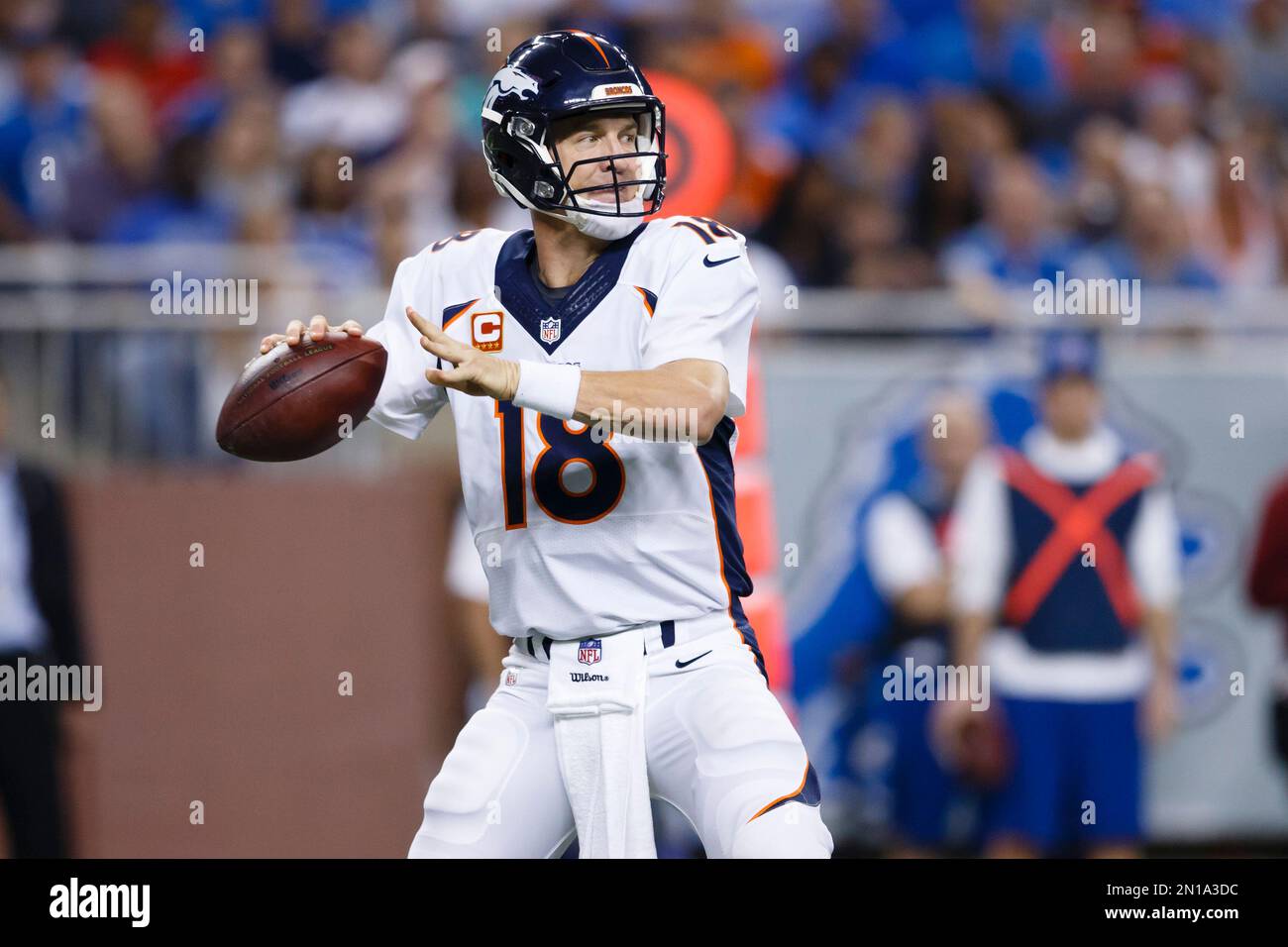 Denver Broncos quarterback Peyton Manning (18) watches a replay against the  Detroit Lions during the first half of an NFL football game, Sunday, Sept.  27, 2015, in Detroit. (AP Photo/Paul Sancya Stock