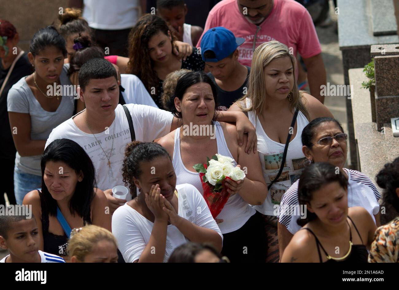 Relatives and friends of Eduardo Felipe Santos Victor, a teenager who ...