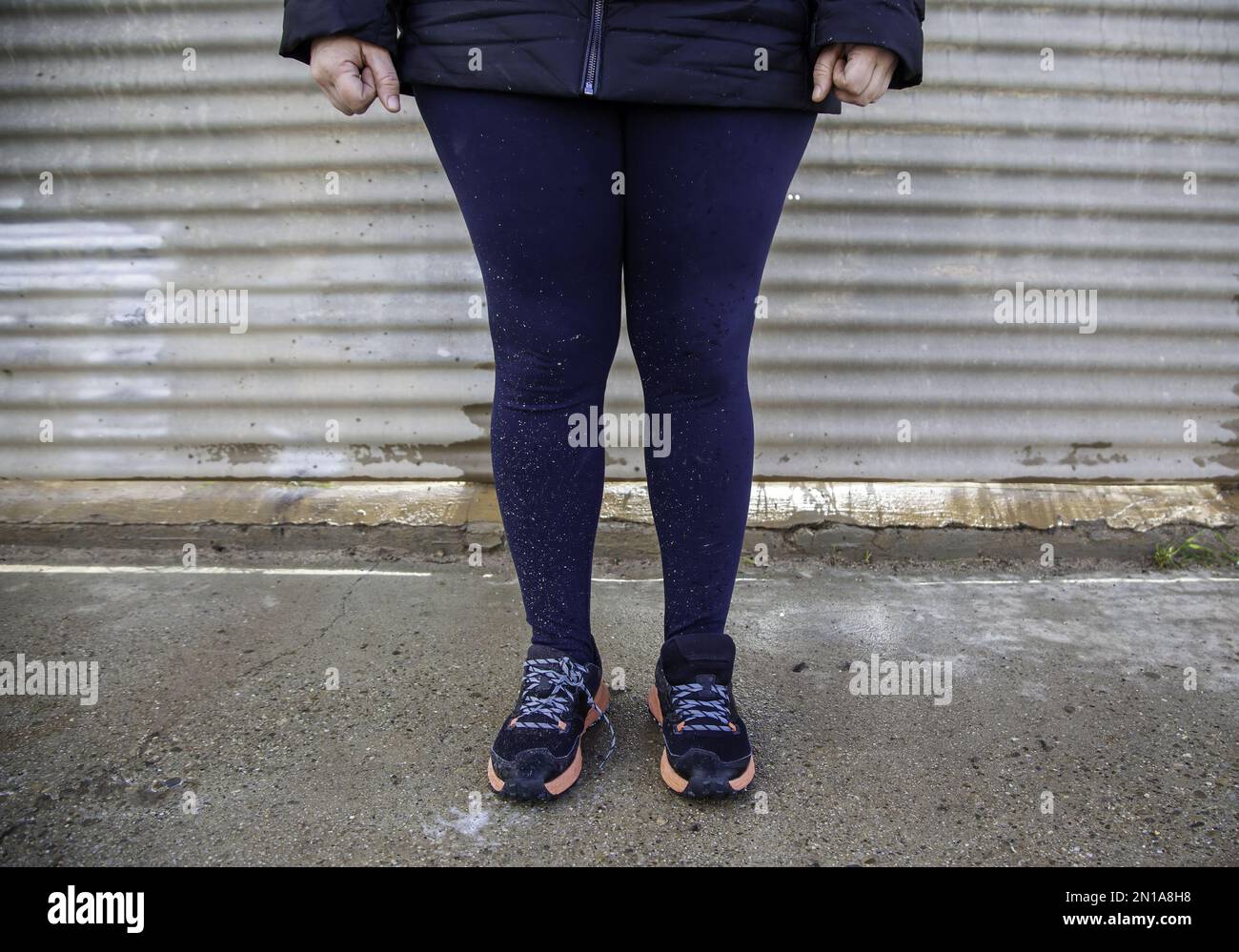 Detail of woman’s legs splattered by mud and dirt Stock Photo - Alamy