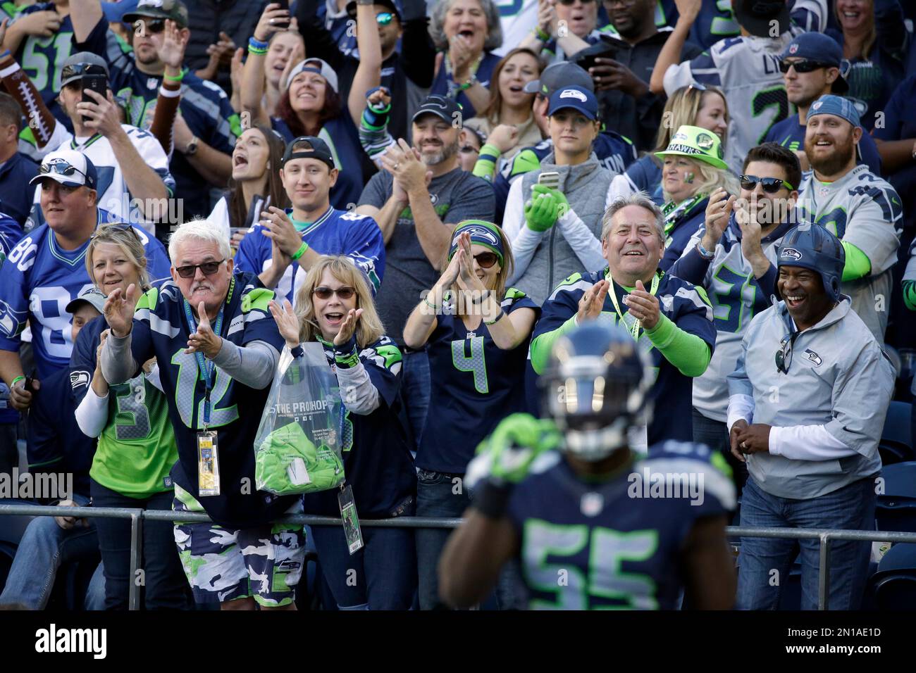 Fans cheer during an NFL Salute to Service ceremony during half time of an  NFL football game between the Seattle Seahawks and the Arizona Cardinals,  Thursday, Nov. 9, 2017, in Glendale, Ariz. (