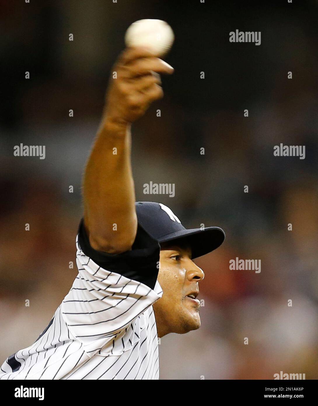 New York Yankees starting pitcher Ivan Nova delivers in the first