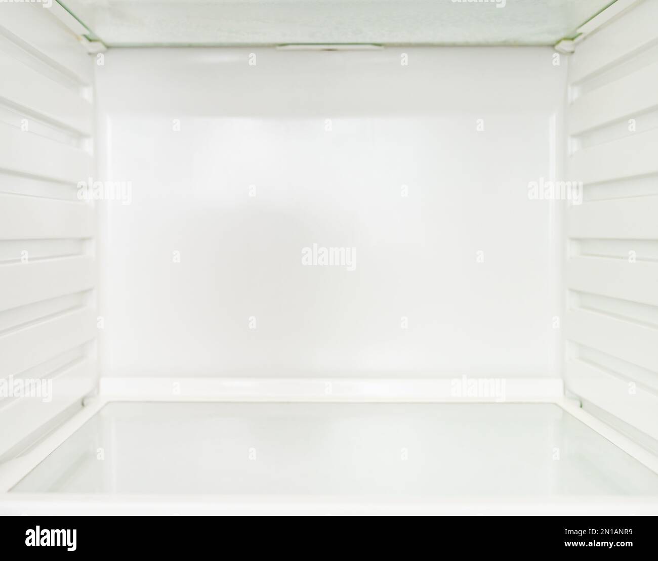 Empty refrigerator shelf as copy space Stock Photo