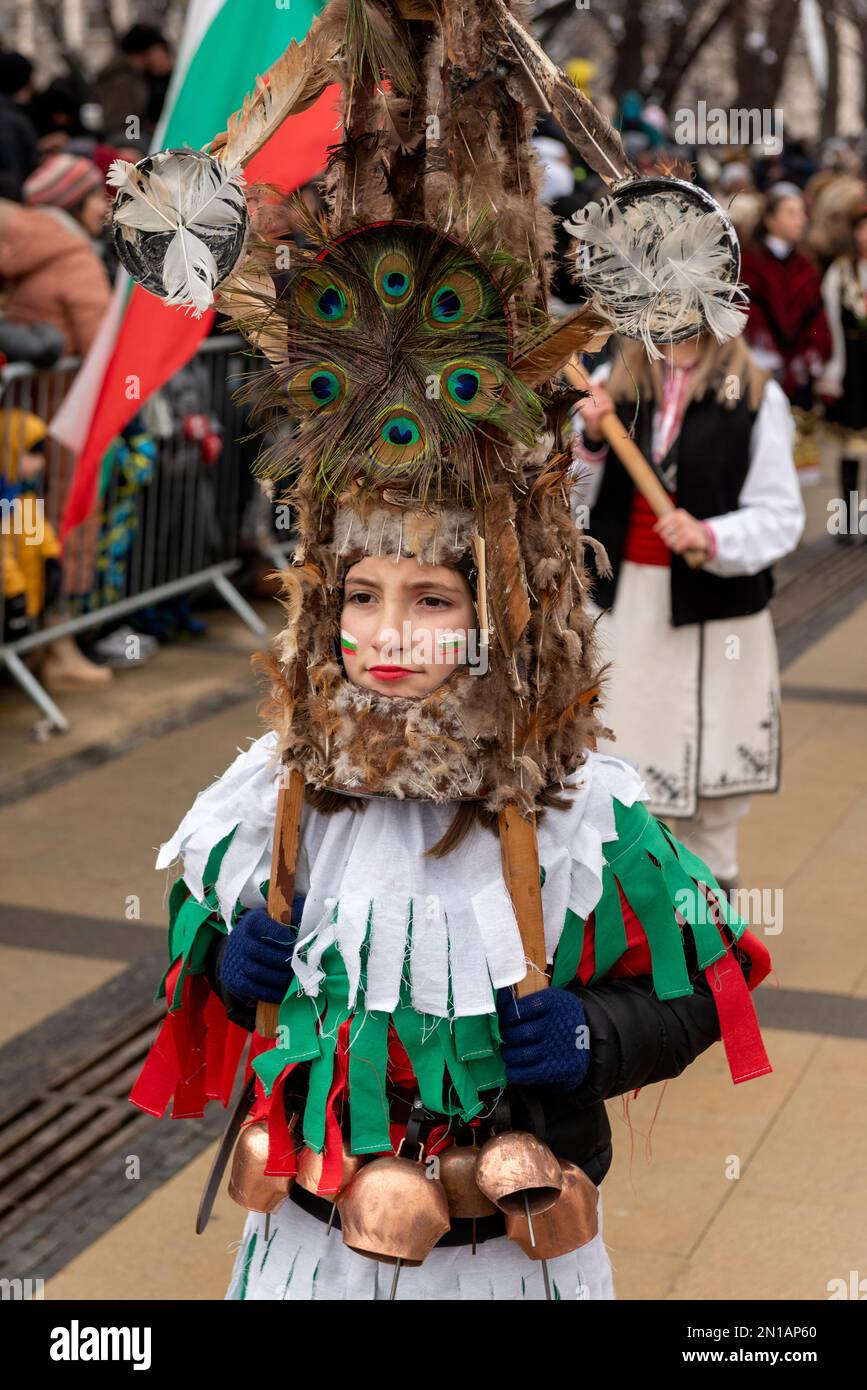 Child with intricate mask at the Surva International Masquerade and Mummers Festival in Pernik, Bulgaria, Eastern Europe, Balkans, EU Stock Photo