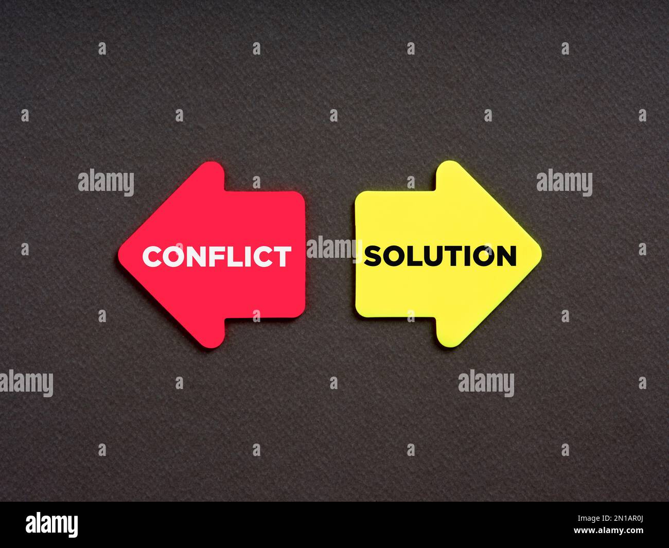 Choosing conflict or solution alternative options. Business finance concept. The words conflict and solution on arrows pointing opposite directions. Stock Photo