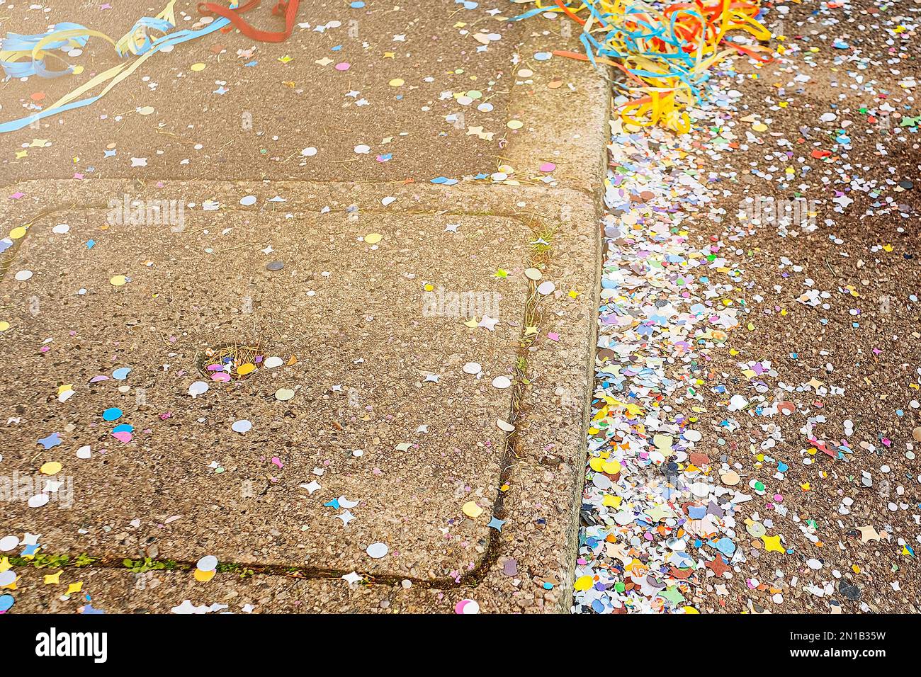 Colorful confetti and streamers at the street after Carnival parade. Italy Stock Photo Alamy